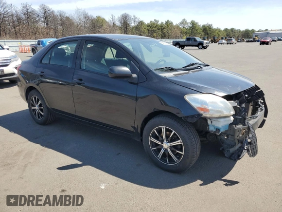 2012 Toyota Yaris with VIN JTDBT4K30CL010867, listed as a Copart auction lot 54128955 with 245,262 mi miles and Salvage Title. Bid and sale history available at carsss.com. Image 4.