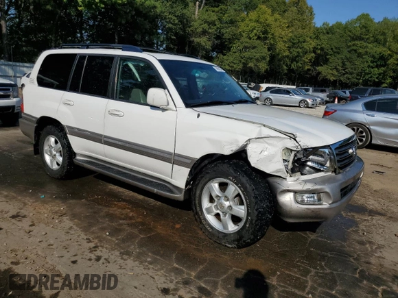 2004 Toyota Land Cruiser with VIN JTEHT05J542066724, listed as a Copart auction lot 74888234 with 244,845 mi miles and Salvage Title. Bid and sale history available at carsss.com. Image 4.