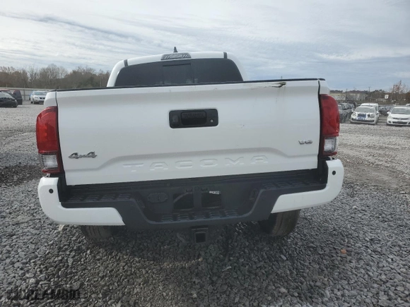 2023 Toyota Tacoma 4WD SR with VIN 3TMCZ5AN2PM593958, listed as a Copart auction lot 84627294 with 18,928 mi miles and Salvage Title. Bid and sale history available at carsss.com. Image 6.