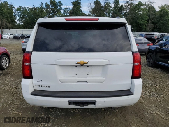 2020 Chevrolet Tahoe LT z VIN 1GNSKBKC7LR301863, wystawiony jako Copart lot #65205365 z przebiegiem 78 866 mil mil oraz Szkoda całkowita • Salvage title. Historia ofert i sprzedaży dostępna na DreamBid. Obrazek 6.