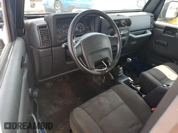 2003 Jeep Wrangler SE with VIN 1J4FA291X3P318888, listed as a Copart auction lot 61616535 with Not provided miles and Clean title. Bid and sale history available at DreamBid. Image 8.