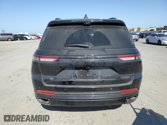 2023 Jeep Grand Cherokee Summit Reserve z VIN 1C4RJYE62PC652630, wystawiony jako Copart lot #55110525 z przebiegiem 21 186 mil mil oraz Szkoda całkowita • Salvage title. Historia ofert i sprzedaży dostępna na DreamBid. Obrazek 6.