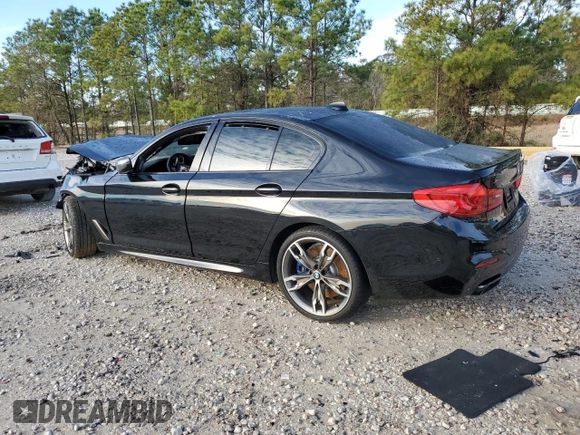 2020 BMW 5 Series M550i xDrive with VIN WBAJS7C01LCD23365, listed as a Copart auction lot 88302885 with Not provided miles and Salvage title. Bid and sale history available at DreamBid. Image 2.