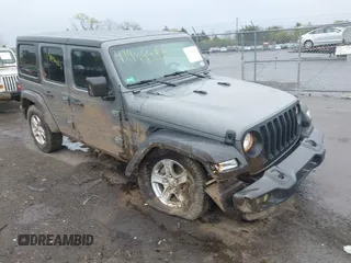 2021 Jeep Wrangler Unlimited Willys z VIN 1C4HJXDN4MW832099, wystawiony jako IAAI lot #41994483 z przebiegiem 63 172 mil mil oraz . Historia ofert i sprzedaży dostępna na DreamBid. Obrazek 1.