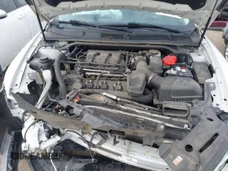 2018 Ford Taurus SEL with VIN 1FAHP2E82JG113133, listed as a IAAI auction lot 41240201 with 146,015 mi miles. Bid and sale history available at carsss.com. Image 10.