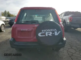 2000 Honda CR-V LX with VIN JHLRD1846YC036376, listed as a Copart auction lot 74011674 with 152,002 mi miles and Salvage Title. Bid and sale history available at carsss.com. Image 6.