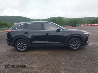 2020 Mazda CX-9 Touring with VIN JM3TCBCY5L0422262, listed as a IAAI auction lot 42456246 with 69,211 mi miles and . Bid and sale history available at DreamBid. Image 13.