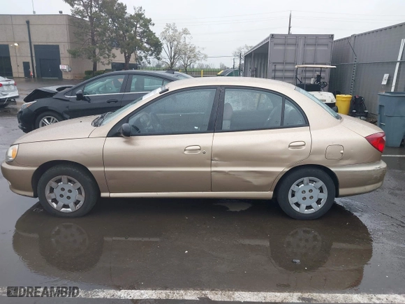 2002 Kia Rio with VIN KNADC123626192611, listed as a IAAI auction lot 41765104 with 62,387 mi miles. Bid and sale history available at carsss.com. Image 14.