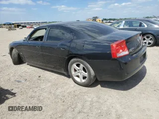2009 Dodge Charger SXT with VIN 2B3KA33V09H503519, listed as a Copart auction lot 52825785 with 112,483 mi miles and Salvage Title. Bid and sale history available at carsss.com. Image 2.