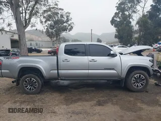 2023 Toyota Tacoma SR5 z VIN 3TMDZ5BN2PM164497, wystawiony jako IAAI lot #42034519 z przebiegiem 25 451 mil mil oraz . Historia ofert i sprzedaży dostępna na DreamBid. Obrazek 13.