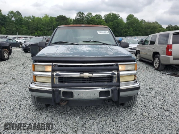 1995 Chevrolet Suburban with VIN 1GNGK16FXSJ380916, listed as a Copart auction lot 57666685 with 269,323 mi miles and Salvage title. Bid and sale history available at DreamBid. Image 5.