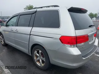 2009 Honda Odyssey Touring with VIN 5FNRL38859B029714, listed as a IAAI auction lot 42266381 with 196,747 mi miles and . Bid and sale history available at DreamBid. Image 3.