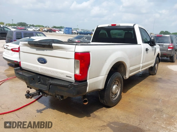 2019 Ford Super Duty F-250 SRW XL with VIN 1FTBF2A61KEC81110, listed as a IAAI auction lot 42021256 with 135,323 mi miles. Bid and sale history available at carsss.com. Image 4.