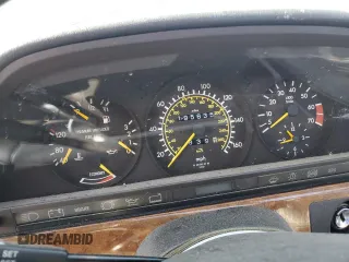 1990 Mercedes-Benz 560 with VIN WDBCA39EXLA503543, listed as a Copart auction lot 65978444 with 195,635 mi miles and Clean Title. Bid and sale history available at DreamBid. Image 9.