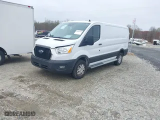 2021 Ford Transit Cargo Van with VIN 1FTBR1Y82MKA44171, listed as a IAAI auction lot 41857534 with 26,295 mi miles. Bid and sale history available at carsss.com. Image 17.