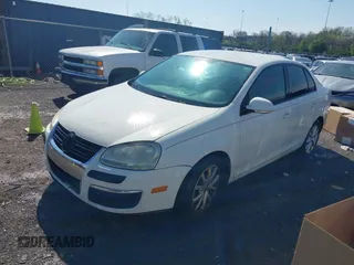 2008 Volkswagen Jetta Sedan S with VIN 3VWJZ71K68M119423, listed as a IAAI auction lot 41942134 with 233,783 mi miles. Bid and sale history available at carsss.com. Image 2.
