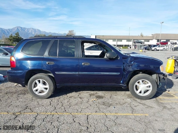 2007 GMC Envoy SLE with VIN 1GKDS13S072127977, listed as a IAAI auction lot 41119560 with 136,291 mi miles. Bid and sale history available at carsss.com. Image 13.