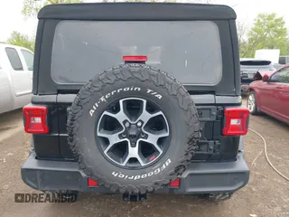 2021 Jeep Wrangler Unlimited Sport S z VIN 1C4HJXDG0MW788779, wystawiony jako IAAI lot #42137430 z przebiegiem 52 903 mil mil oraz . Historia ofert i sprzedaży dostępna na DreamBid. Obrazek 16.