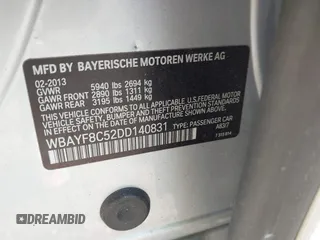 2013 BMW 7 Series 750Li xDrive with VIN WBAYF8C52DD140831, listed as a IAAI auction lot 41941071 with 207,251 mi miles. Bid and sale history available at carsss.com. Image 9.