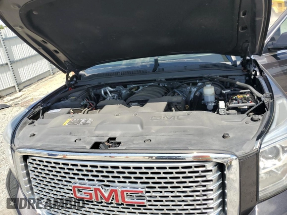 2017 GMC Yukon Denali with VIN 1GKS2CKJ3HR360319, listed as a Copart auction lot 70051014 with 127,896 mi miles and Salvage Title. Bid and sale history available at carsss.com. Image 13.