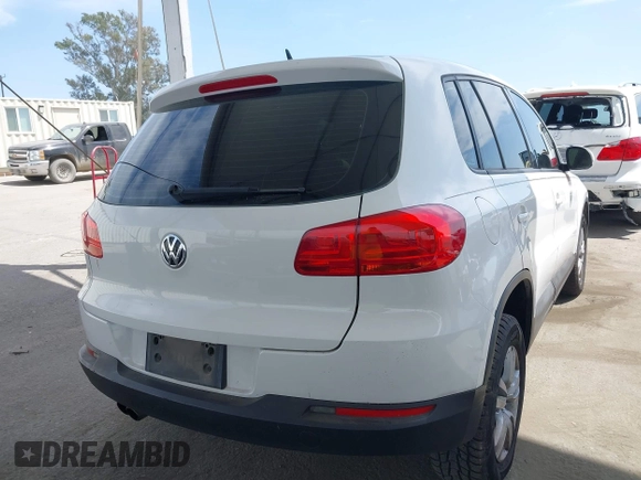 2014 Volkswagen Tiguan SEL with VIN WVGAV3AX0EW524669, listed as a IAAI auction lot 42289003 with 94,513 mi miles and . Bid and sale history available at DreamBid. Image 4.