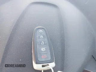 2014 Ford Escape Titanium with VIN 1FMCU0J91EUE12034, listed as a IAAI auction lot 42027493 with 160,417 mi miles and . Bid and sale history available at DreamBid. Image 11.