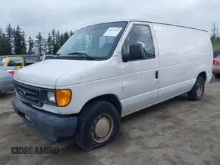2003 Ford Econoline Cargo with VIN 1FTRE14273HB37890, listed as a IAAI auction lot 42075291 with 212,428 mi miles and . Bid and sale history available at DreamBid. Image 2.
