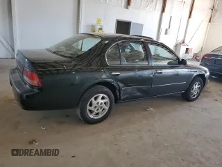 1999 Nissan Maxima GXE z VIN JN1CA21D0XT808755, wystawiony jako Copart lot #49693685 z przebiegiem 63 389 mil mil oraz Szkoda całkowita • Salvage title. Historia ofert i sprzedaży dostępna na DreamBid. Obrazek 3.