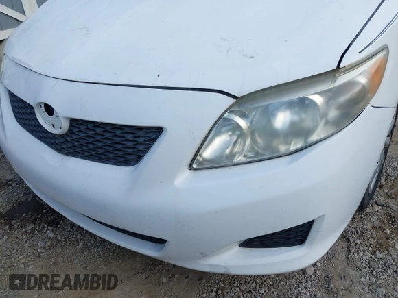 2010 Toyota Corolla with VIN 2T1BU4EE1AC312151, listed as a IAAI auction lot 42761709 with 121,356 mi miles and . Bid and sale history available at DreamBid. Image 17.