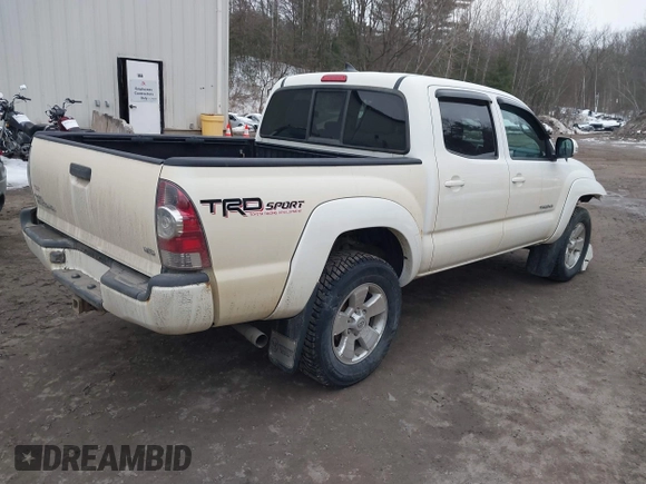 2014 Toyota Tacoma with VIN 3TMLU4EN5EM157590, listed as a IAAI auction lot 41687141 with 111,836 mi miles. Bid and sale history available at carsss.com. Image 4.