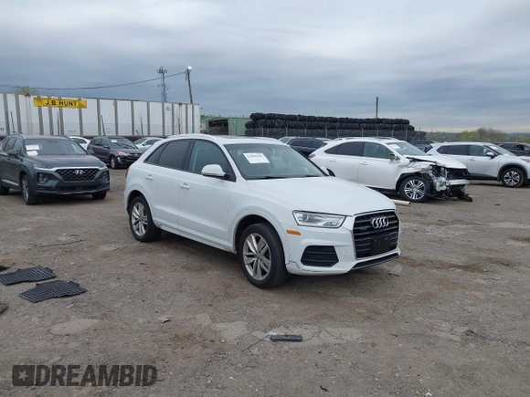 2017 Audi Q3 Premium z VIN WA1ECCFS7HR007729, wystawiony jako IAAI lot #42066580 z przebiegiem 116 460 mil mil oraz . Historia ofert i sprzedaży dostępna na DreamBid. Obrazek 1.