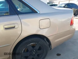 2001 Toyota Avalon XL z VIN 4T1BF28B31U185174, wystawiony jako IAAI lot #42338204 z przebiegiem 298 540 mil mil oraz . Historia ofert i sprzedaży dostępna na DreamBid. Obrazek 19.