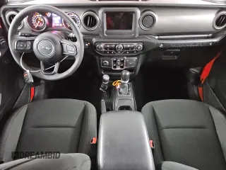 2023 Jeep Wrangler Sport S with VIN 1C4HJXDN5PW632854, listed as a Copart auction lot 51674525 with 4,837 mi miles and Clean Title. Bid and sale history available at DreamBid. Image 8.