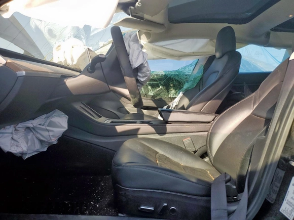 2021 Tesla Model 3 Standard Range Plus with VIN 5YJ3E1EA2MF977007, listed as a Copart auction lot 48516075 with Not Provided miles and Salvage Title. Bid and sale history available at DreamBid. Image 7.
