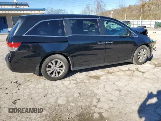 2014 Honda Odyssey EX-L with VIN 5FNRL5H69EB121140, listed as a Copart auction lot 79698724 with 169,626 mi miles and Salvage Title. Bid and sale history available at DreamBid. Image 3.