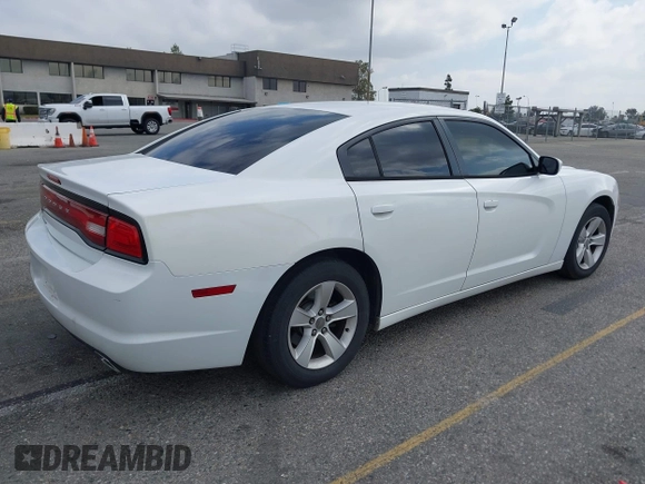 2014 Dodge Charger SE with VIN 2C3CDXBG3EH131242, listed as a IAAI auction lot 42121260 with 231,452 mi miles and . Bid and sale history available at DreamBid. Image 4.