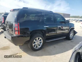 2014 GMC Yukon Denali with VIN 1GKS2EEF6ER137805, listed as a Copart auction lot 69835144 with 167,244 mi miles and Salvage Title. Bid and sale history available at carsss.com. Image 3.