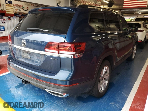 2023 Volkswagen Atlas SE z VIN 1V2HR2CA5PC527628, wystawiony jako IAAI lot #42569146 z przebiegiem 27 424 mil mil oraz . Historia ofert i sprzedaży dostępna na DreamBid. Obrazek 20.