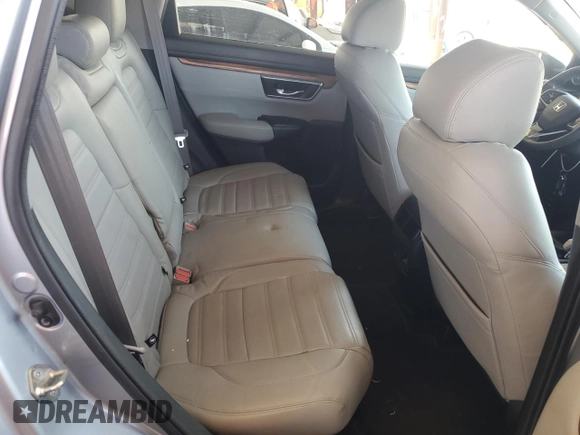 2019 Honda CR-V EX z VIN 7FARW1H50KE023802, wystawiony jako Copart lot #58191285 z przebiegiem 55 067 mil mil oraz Szkoda całkowita • Salvage title. Historia ofert i sprzedaży dostępna na DreamBid. Obrazek 11.