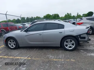 2015 Dodge Charger SXT with VIN 2C3CDXHG1FH886088, listed as a IAAI auction lot 42331369 with 119,659 mi miles and . Bid and sale history available at DreamBid. Image 14.