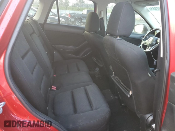 2014 Mazda CX-5 Touring с VIN JM3KE2CY3E0308740, выставлен на аукционе Copart как лот 88127365 с пробегом 137 690 миль миль и Списание • Salvage title. История ставок и продаж доступна на DreamBid. Изображение 11.