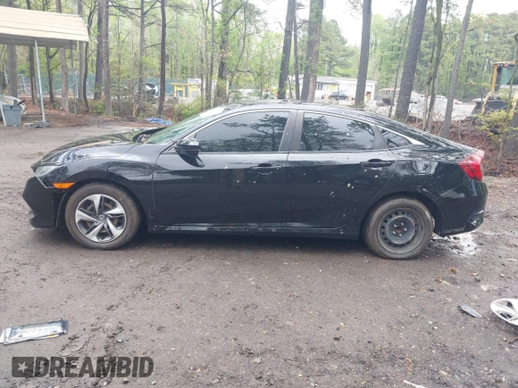 2019 Honda Civic LX with VIN 19XFC2F64KE041024, listed as a IAAI auction lot 42020159 with 36,870 mi miles and . Bid and sale history available at DreamBid. Image 14.