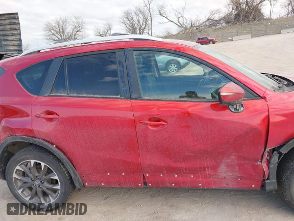 2016 Mazda CX-5 Grand Touring with VIN JM3KE4DY8G0729446, listed as a IAAI auction lot 41871207 with 89,258 mi miles. Bid and sale history available at carsss.com. Image 14.