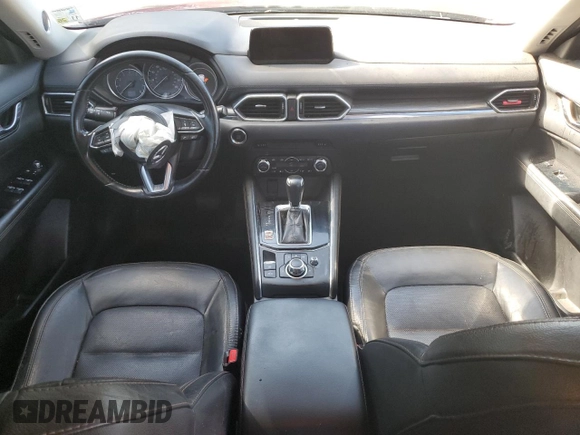 2018 Mazda CX-5 Grand Touring with VIN JM3KFADM9J0398036, listed as a Copart auction lot 62284145 with 118,827 mi miles and Salvage title. Bid and sale history available at DreamBid. Image 8.
