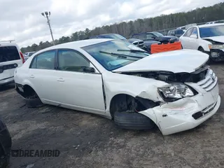 2007 Toyota Avalon XL with VIN 4T1BK36B47U175024, listed as a IAAI auction lot 41212052 with 165,167 mi miles. Bid and sale history available at carsss.com. Image 12.