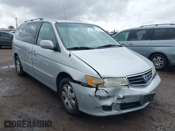 2003 Honda Odyssey EX-L z VIN 5FNRL18033B096575, wystawiony jako IAAI lot #41576926 z przebiegiem 210 932 mil mil oraz . Historia ofert i sprzedaży dostępna na DreamBid. Obrazek 6.