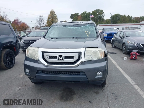 2011 Honda Pilot EX-L z VIN 5FNYF3H52BB046999, wystawiony jako IAAI lot #40854435 z przebiegiem 179 852 mil mil oraz . Historia ofert i sprzedaży dostępna na DreamBid. Obrazek 12.