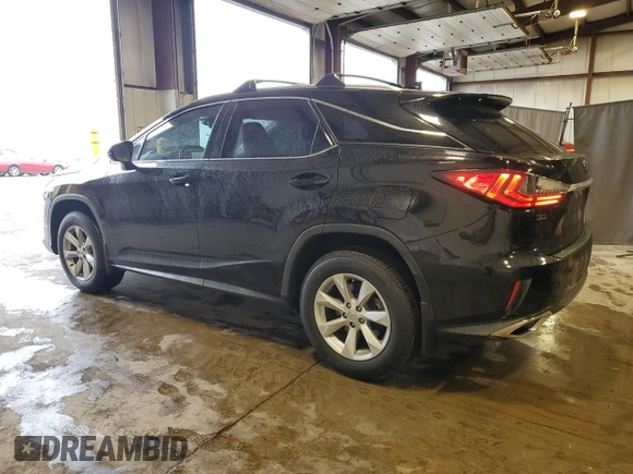 2016 Lexus RX 350 with VIN 2T2BZMCA3GC001679, listed as a Copart auction lot 57070835 with 74,729 mi miles and Salvage Title. Bid and sale history available at DreamBid. Image 2.