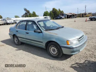1994 Toyota Tercel DX z VIN JT2EL43T6R0457122, wystawiony jako Copart lot #54426595 z przebiegiem 201 177 mil mil oraz Czysty tytuł • Clean title. Historia ofert i sprzedaży dostępna na DreamBid. Obrazek 4.