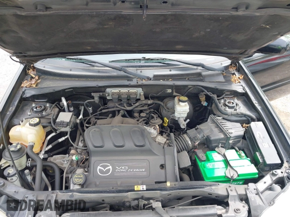 2005 Mazda Tribute S with VIN 4F2CZ96185KM16560, listed as a IAAI auction lot 42065748 with 84,584 mi miles and . Bid and sale history available at carsss.com. Image 10.